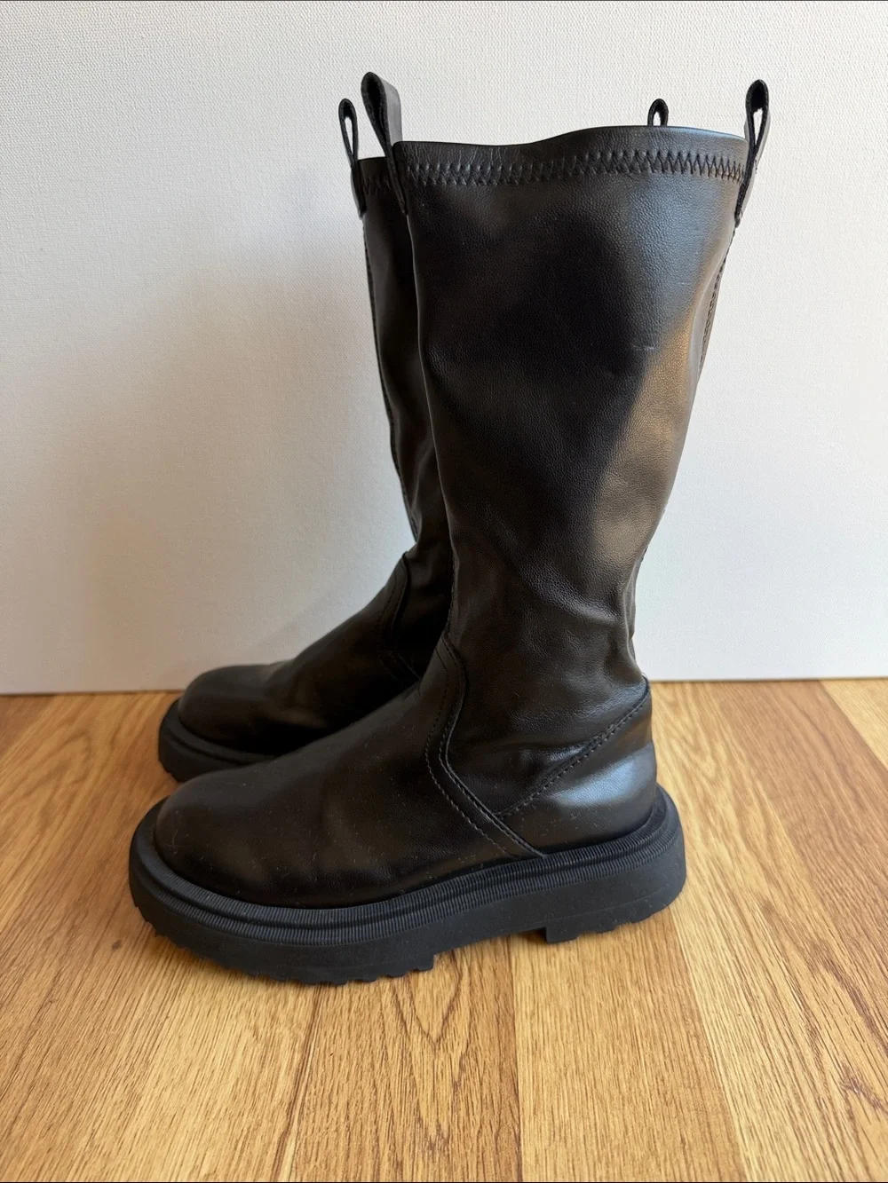 Zara Girls Treaded Knee-High Boots in black.
